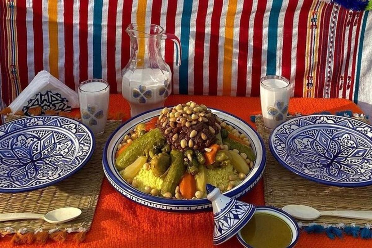 a table with blue and white plates of food