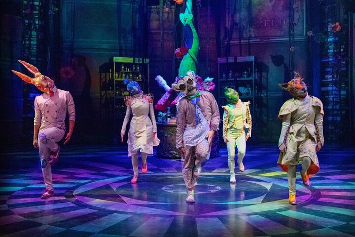 a group of people walking on a stage