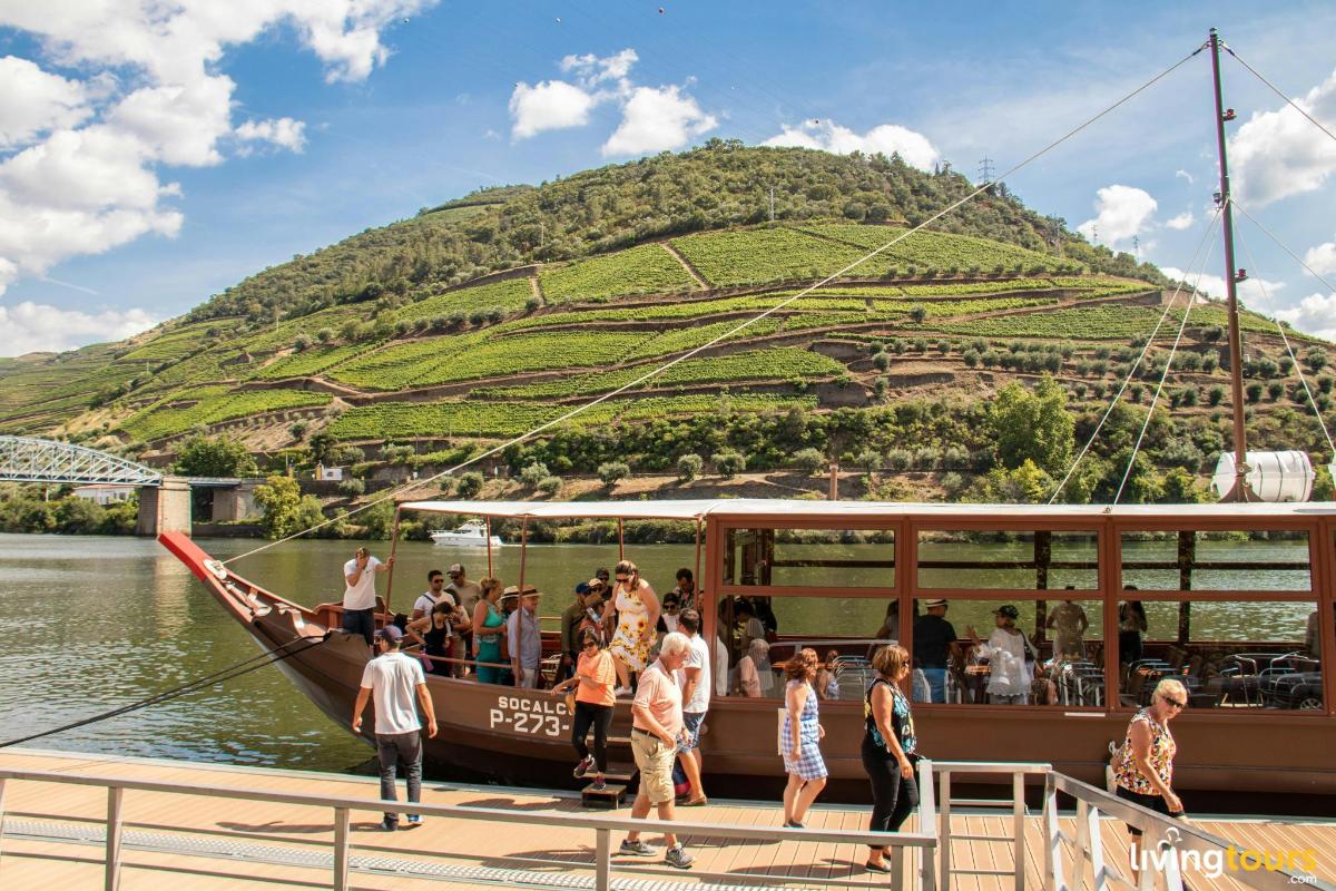 a group of people on a boat on the river