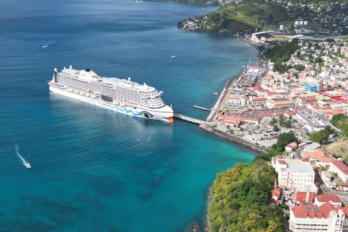 a cruise ship is docked in a harbor