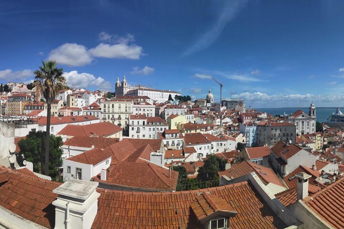 a view of a city with roofs and buildings