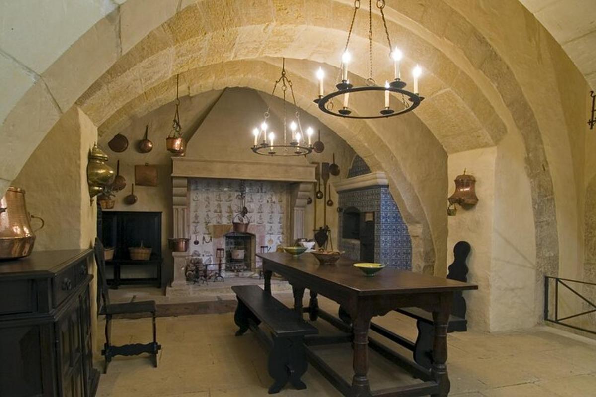 a dining room with a table and a fireplace