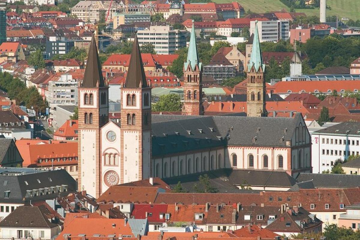 a large building with a clock tower in a city