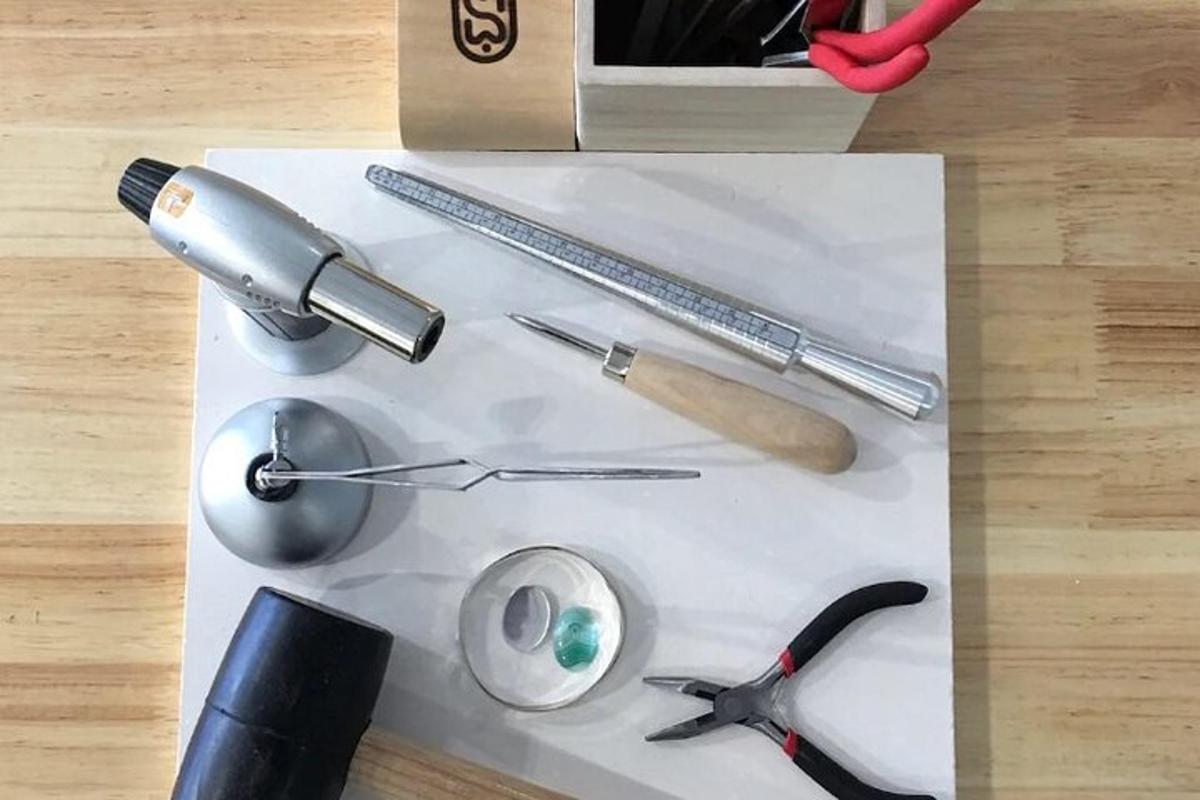 a set of kitchen utensils on a white paper