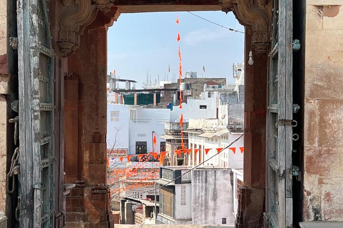 an open window view of a city from a building