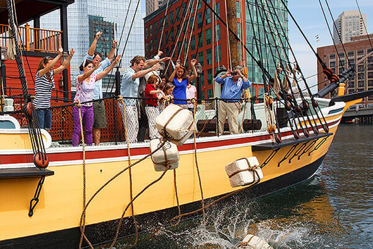 a group of people on a boat in the water