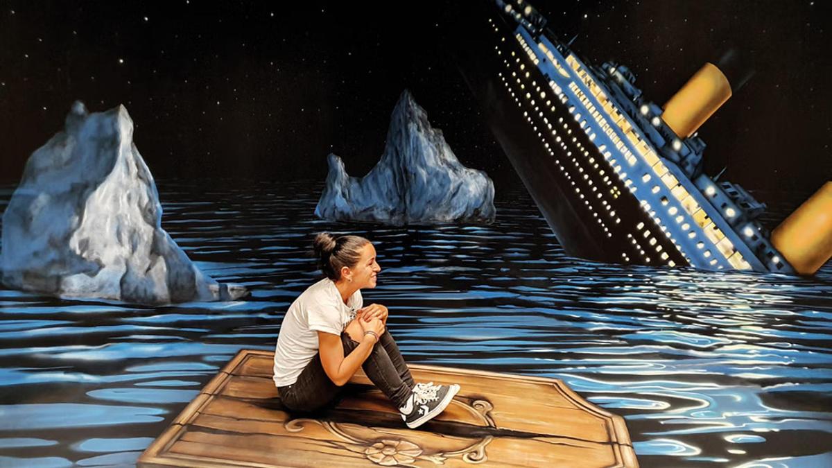 a woman sitting on a raft in the water