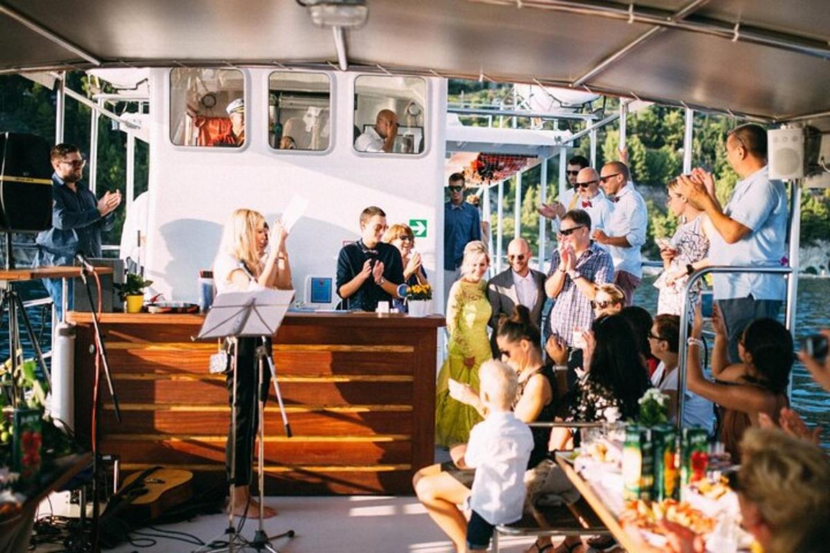 a wedding ceremony in a boat with people