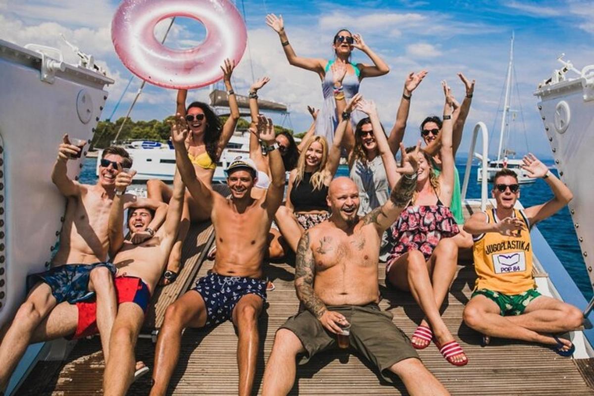 a group of people posing for a picture on a boat