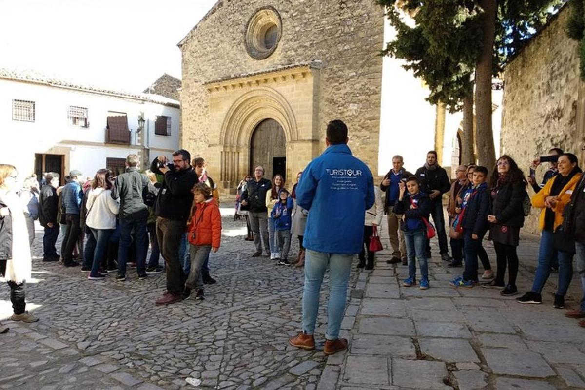 a crowd of people standing in front of a building