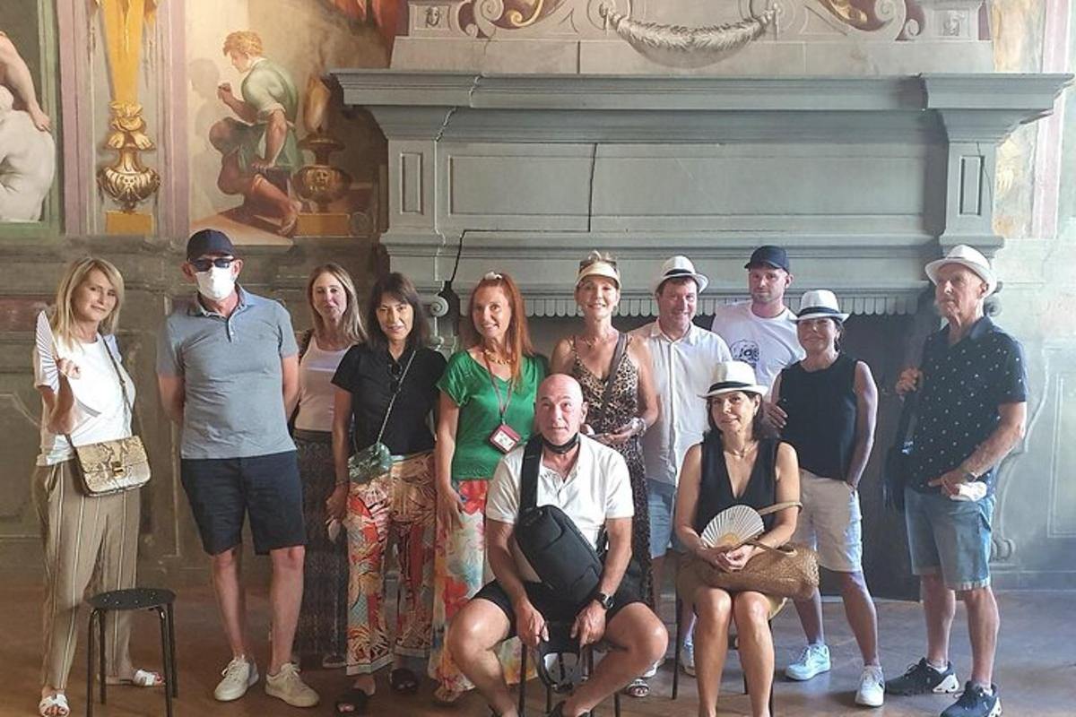 a group of people posing for a picture in a room