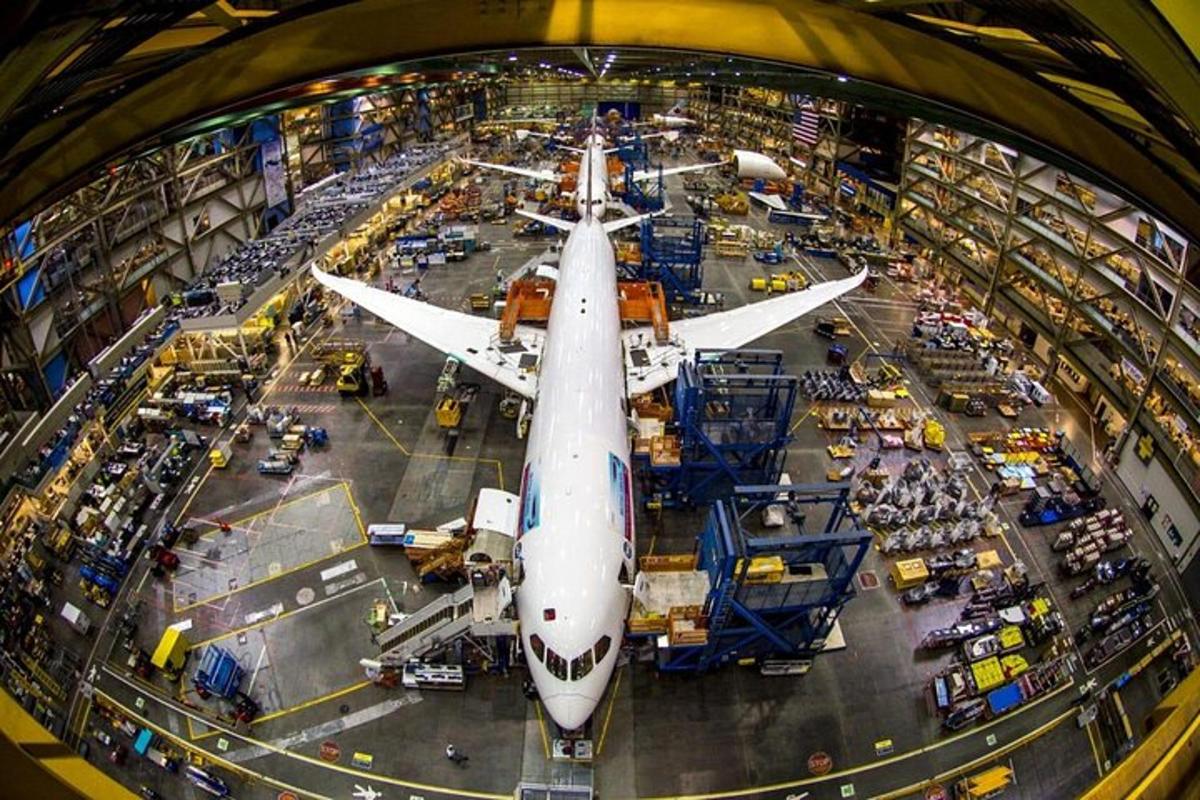 an overhead view of an airplane in a factory