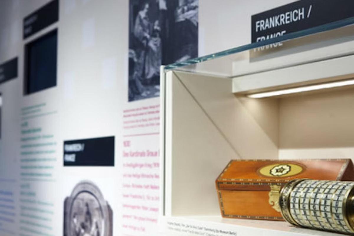 a box on a shelf next to a display