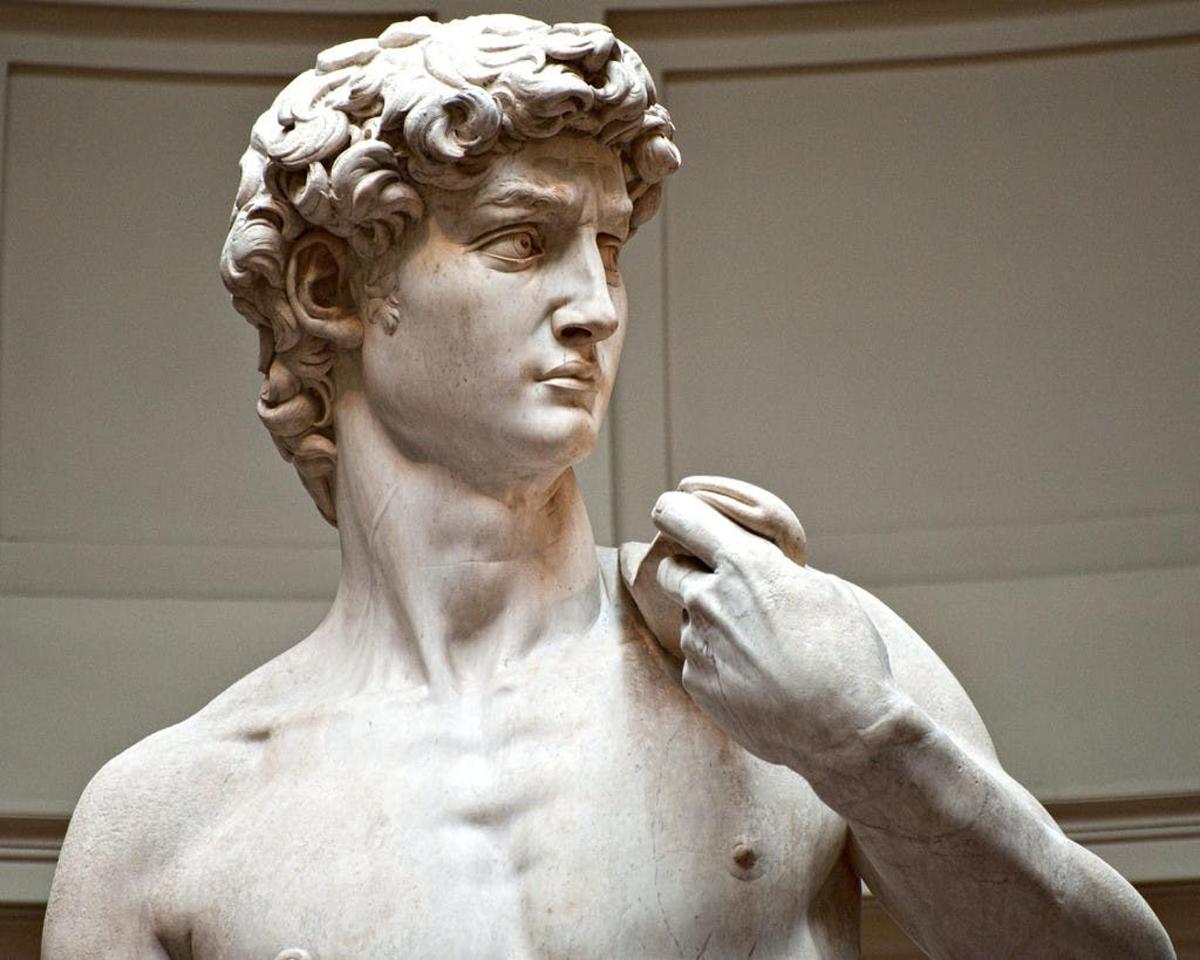 a statue of a man in a museum