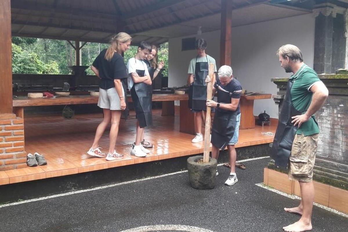 a group of people standing on a wooden deck