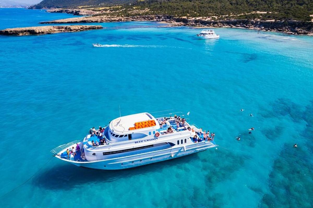 a boat in the water with a group of people on it