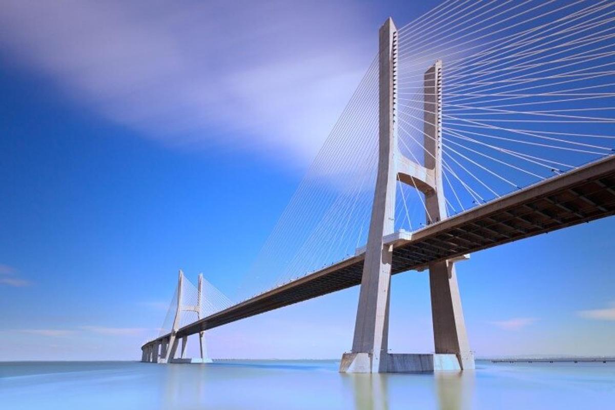 a bridge over the water on a clear day