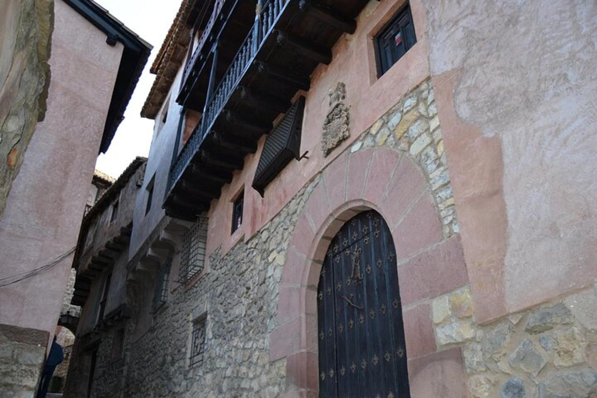 a stone building with a door on the side of it