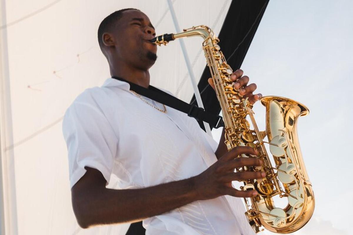 a man playing a saxophone on a stage