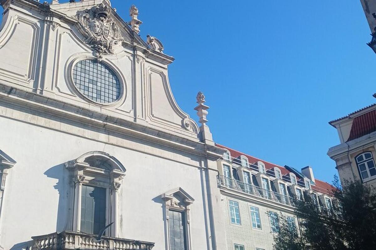 a white building with a window on the side of it