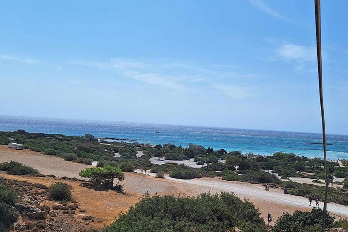 a view of a beach with the ocean in the background