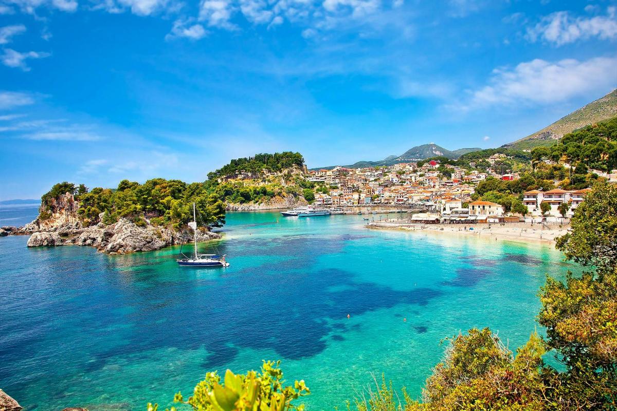 a view of a beach with boats in the water