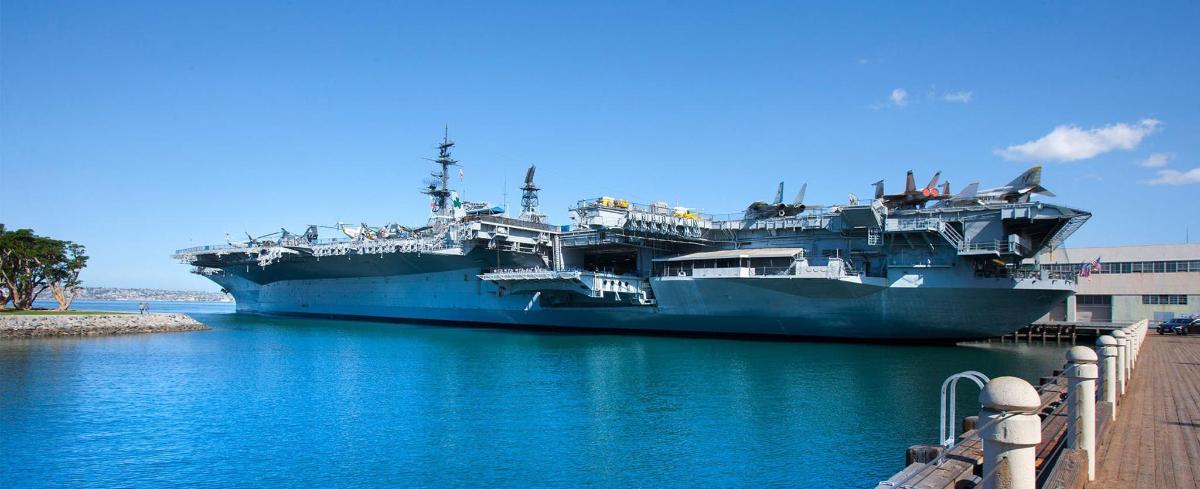 a large ship is docked in the water