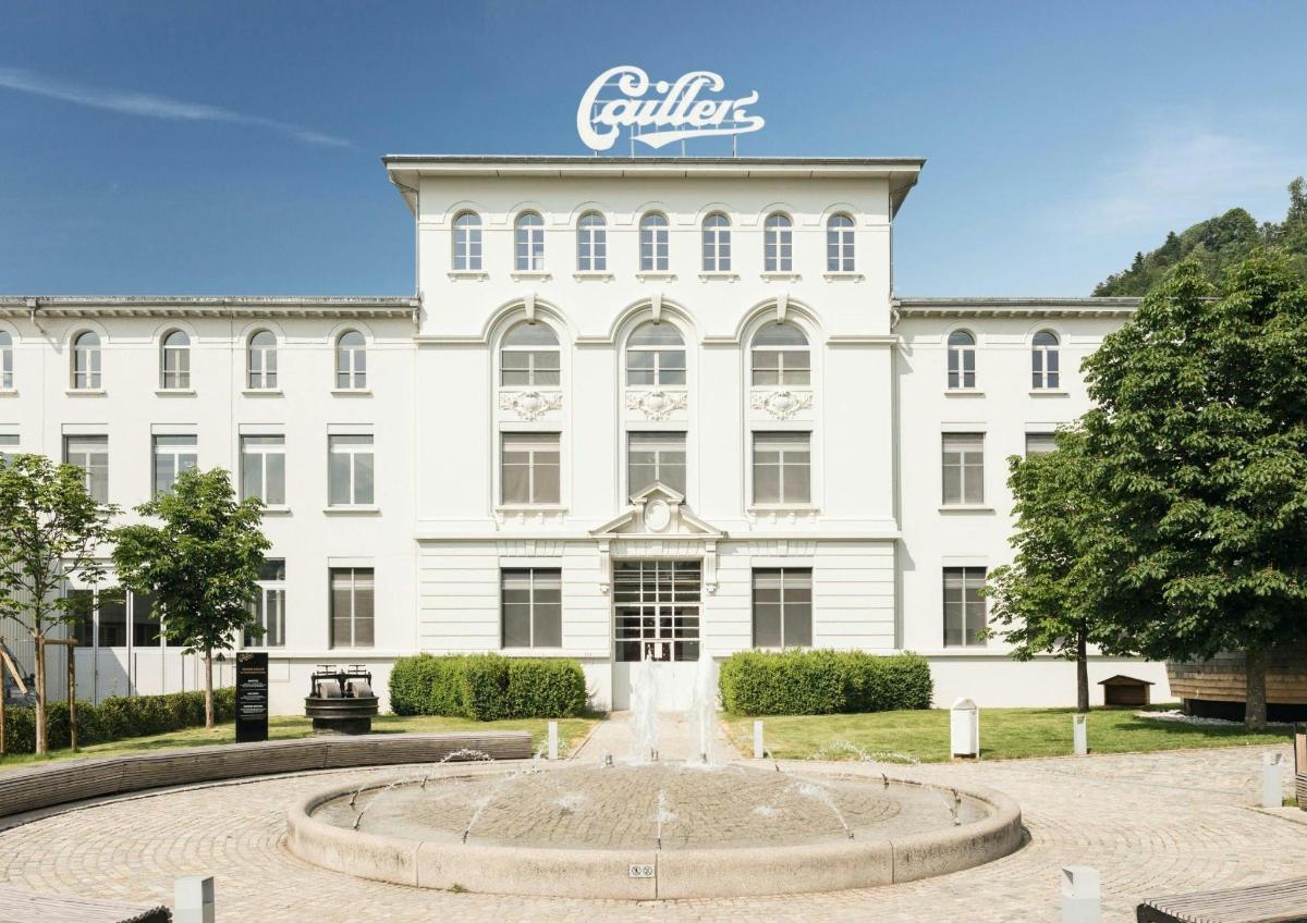 a large white building with a sign on it