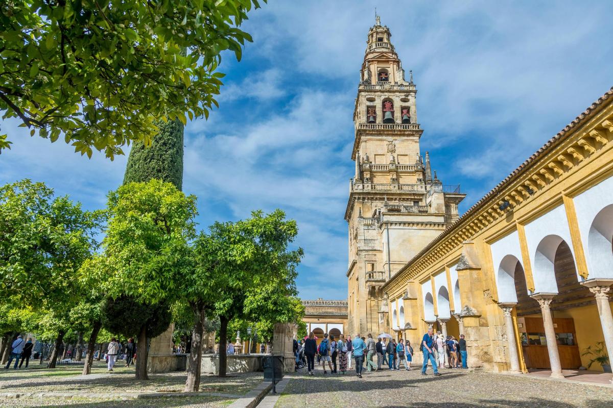 a view of the clock tower in the city of segovia