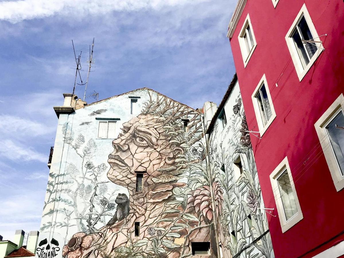 a mural of a lion on the side of a building