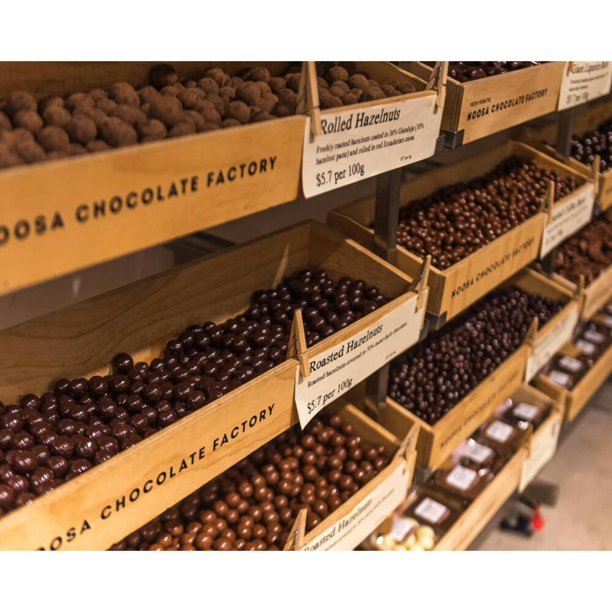 a display of chestnuts in boxes in a store