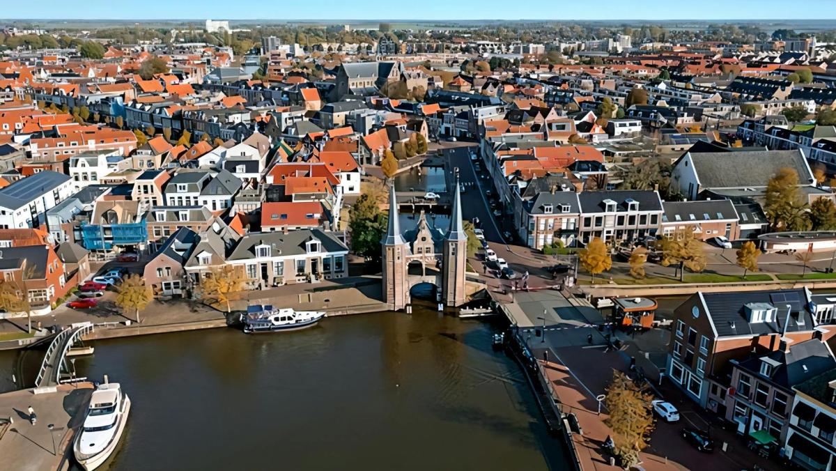 an aerial view of a city with a river
