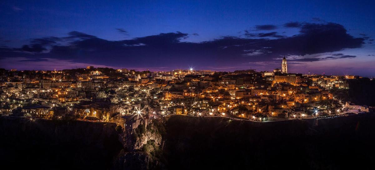 a view of a city at night with lights