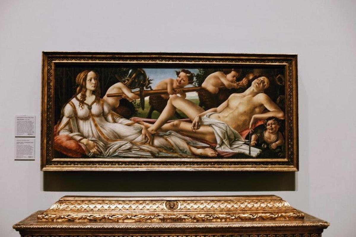 a painting of a group of people in a museum