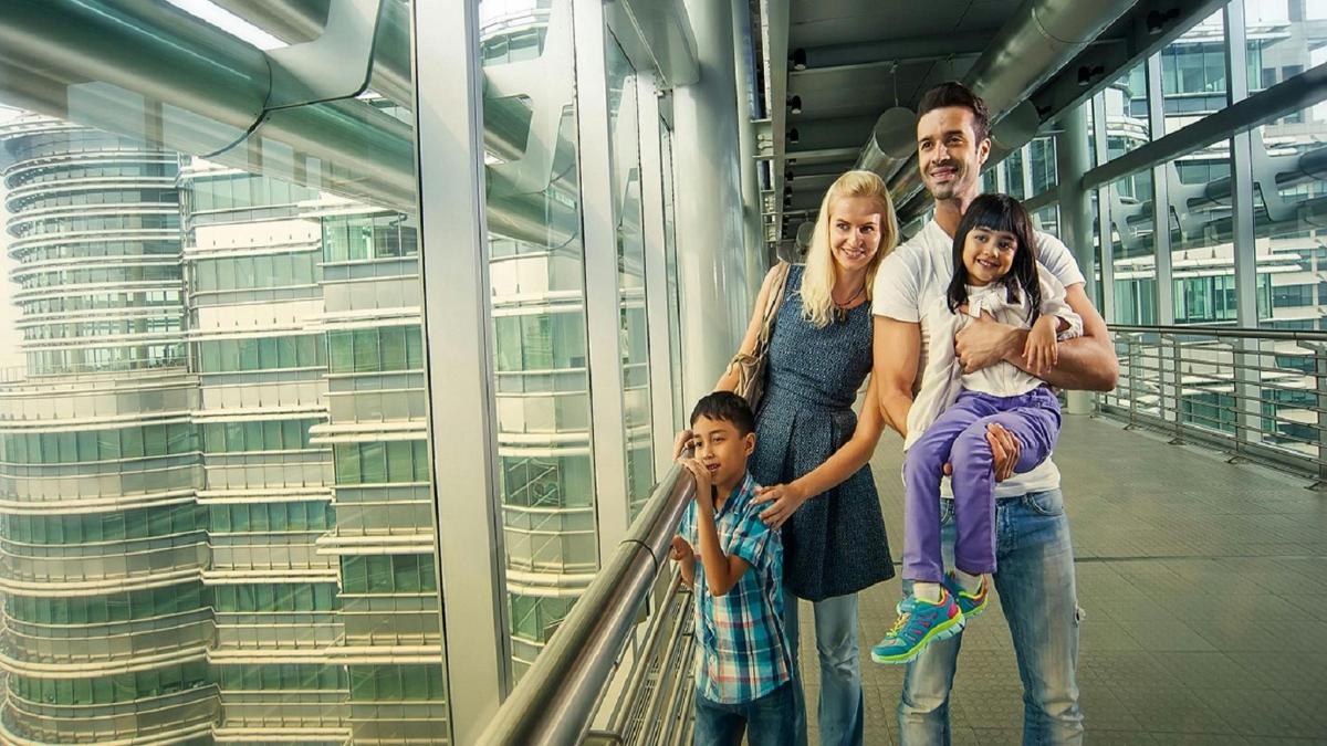 a family posing for a picture in a building