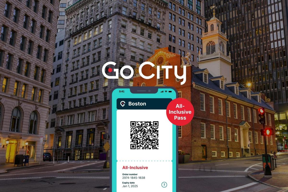 μια πινακίδα go city με ένα κινητό τηλέφωνο σε έναν δρόμο