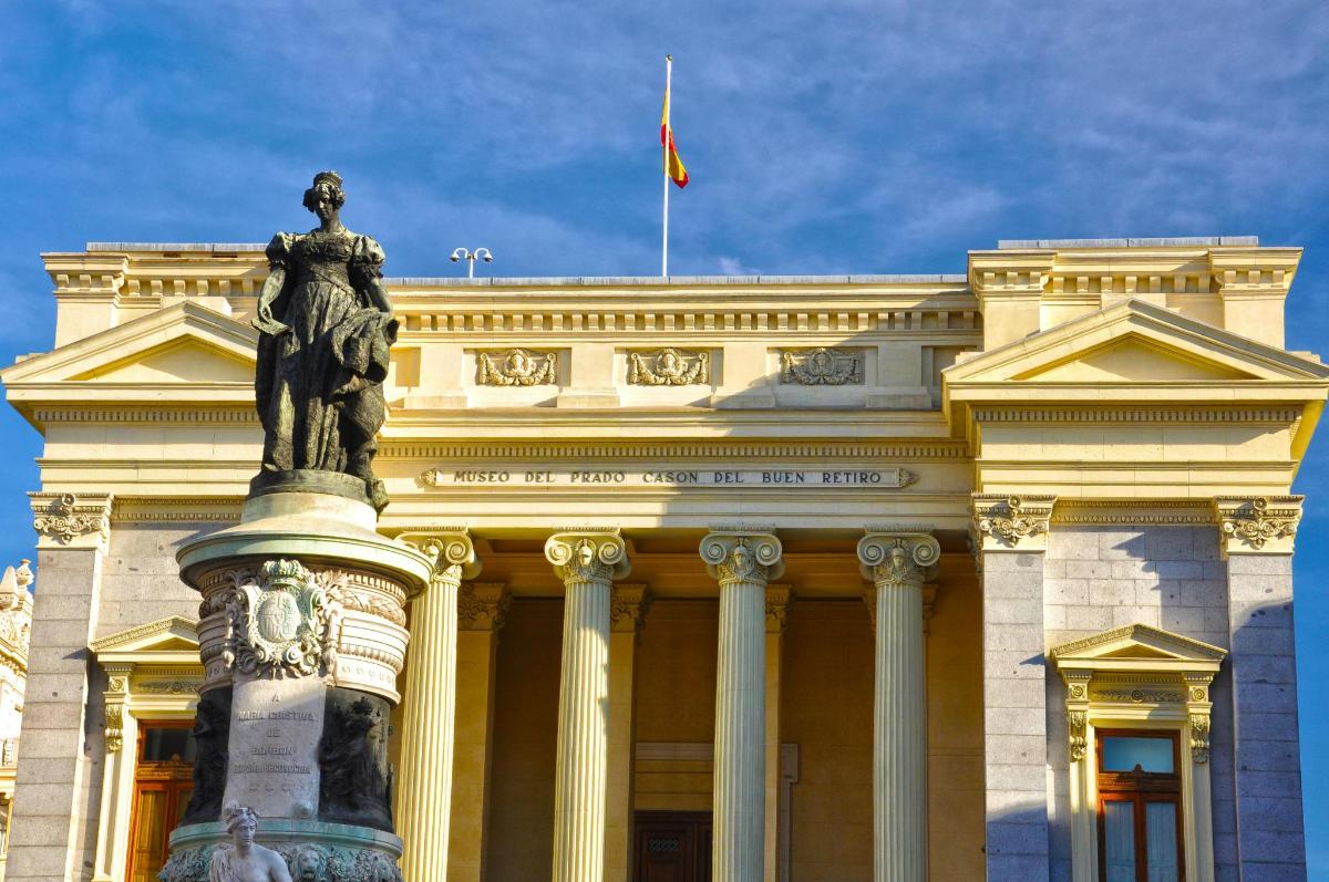 a building with a statue in front of it