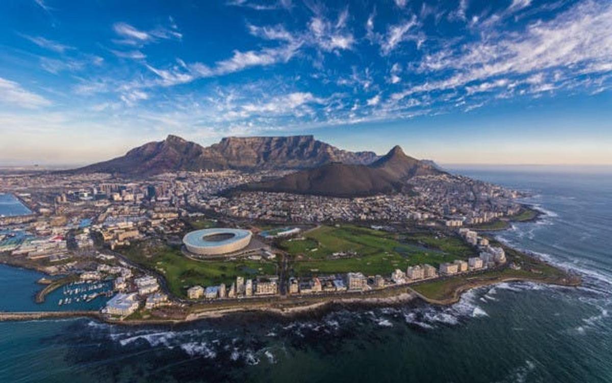 an aerial view of cape town and the table mountain