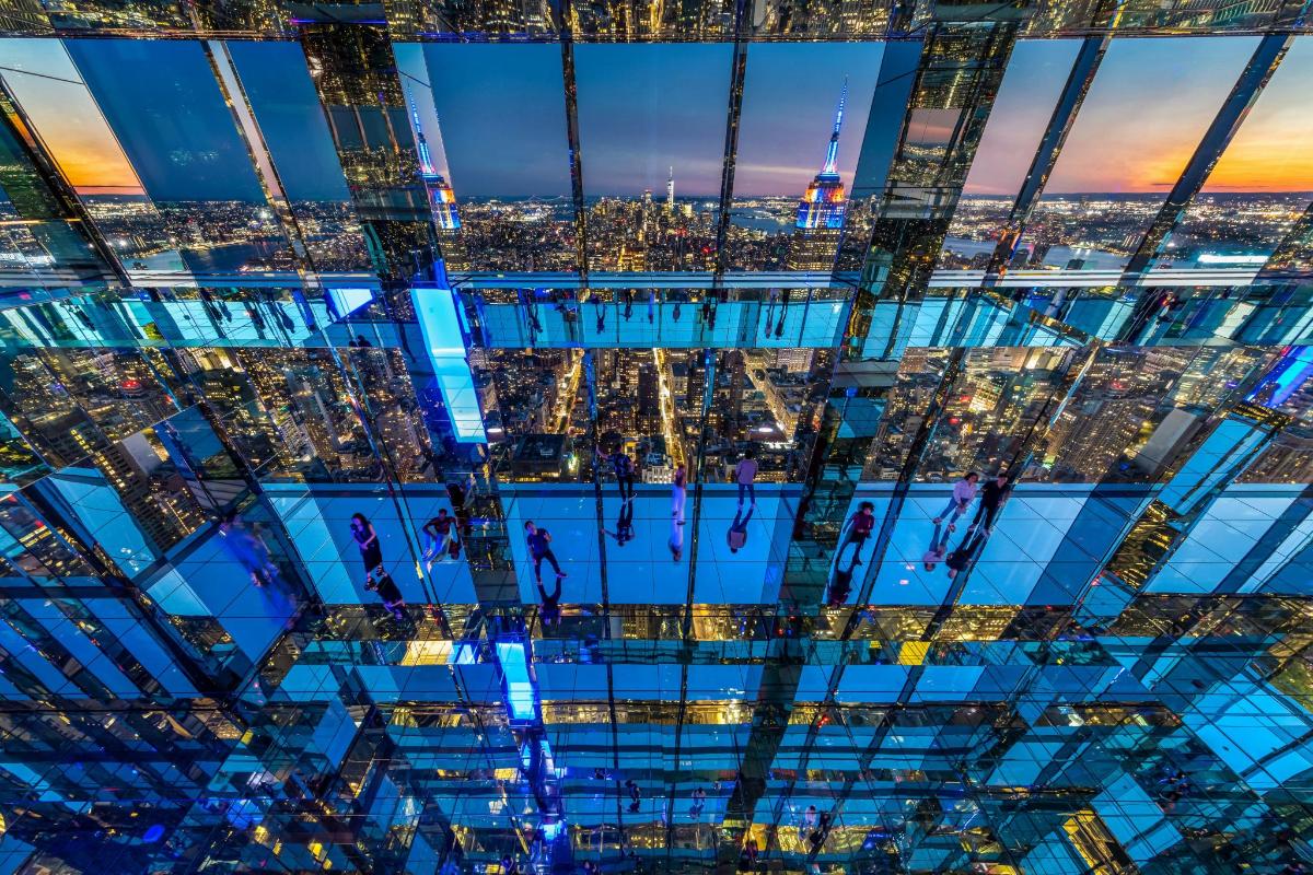 a view of the city from the top of a skyscraper