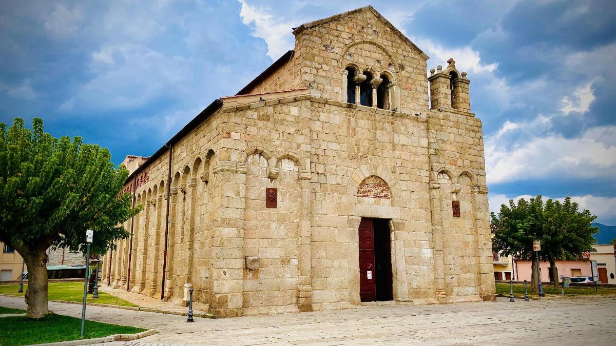a large stone church with a large tower