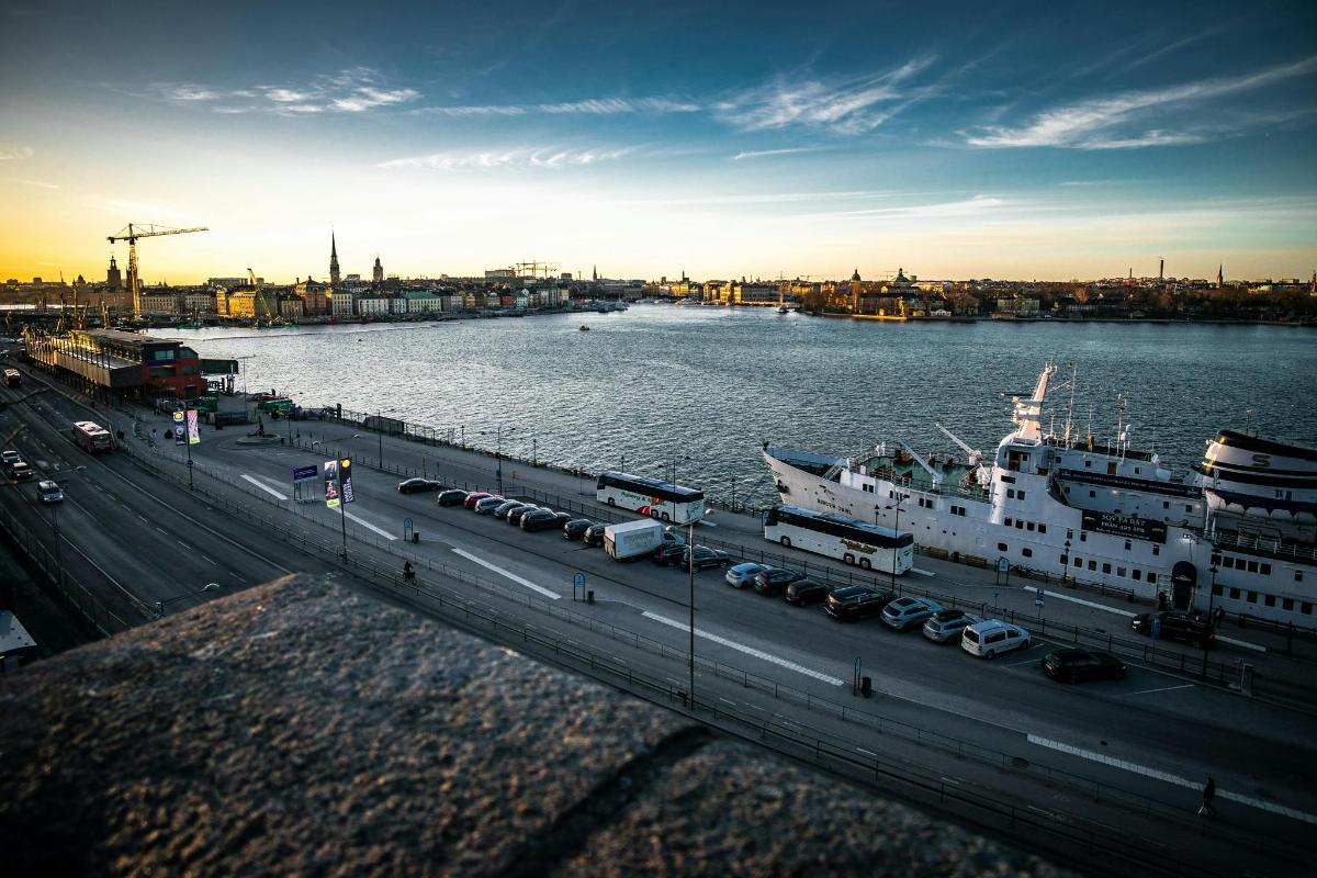 a large cruise ship is docked in a harbor