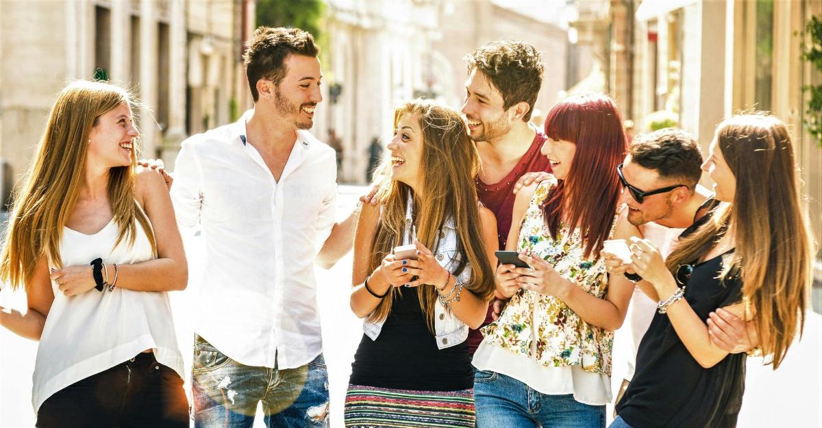a group of people walking down the street