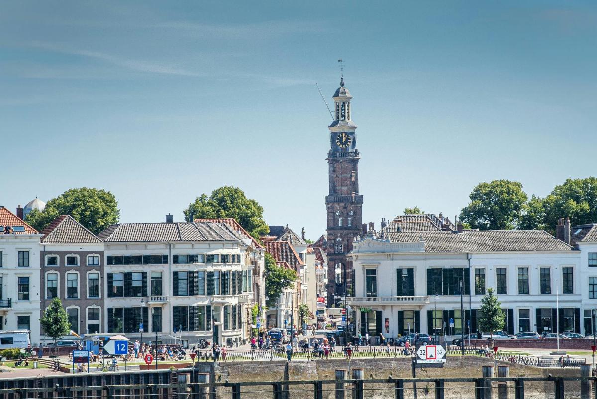 a city with a clock tower in the background