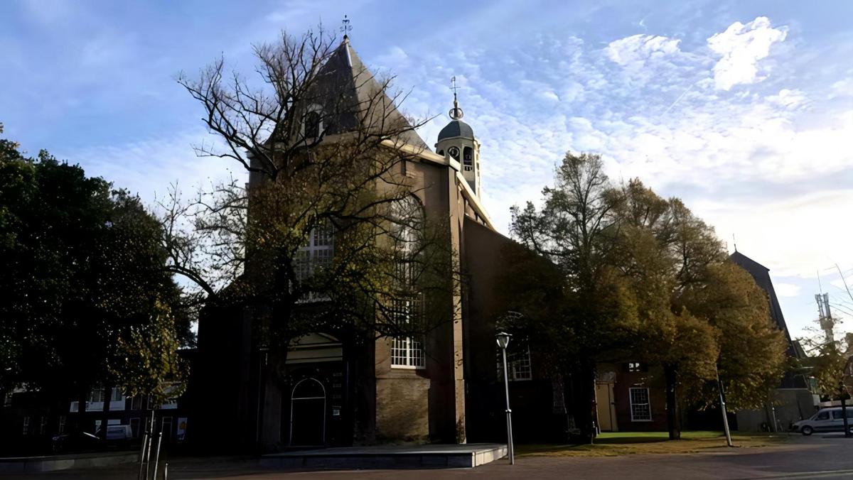 a large brick building with a clock tower on it