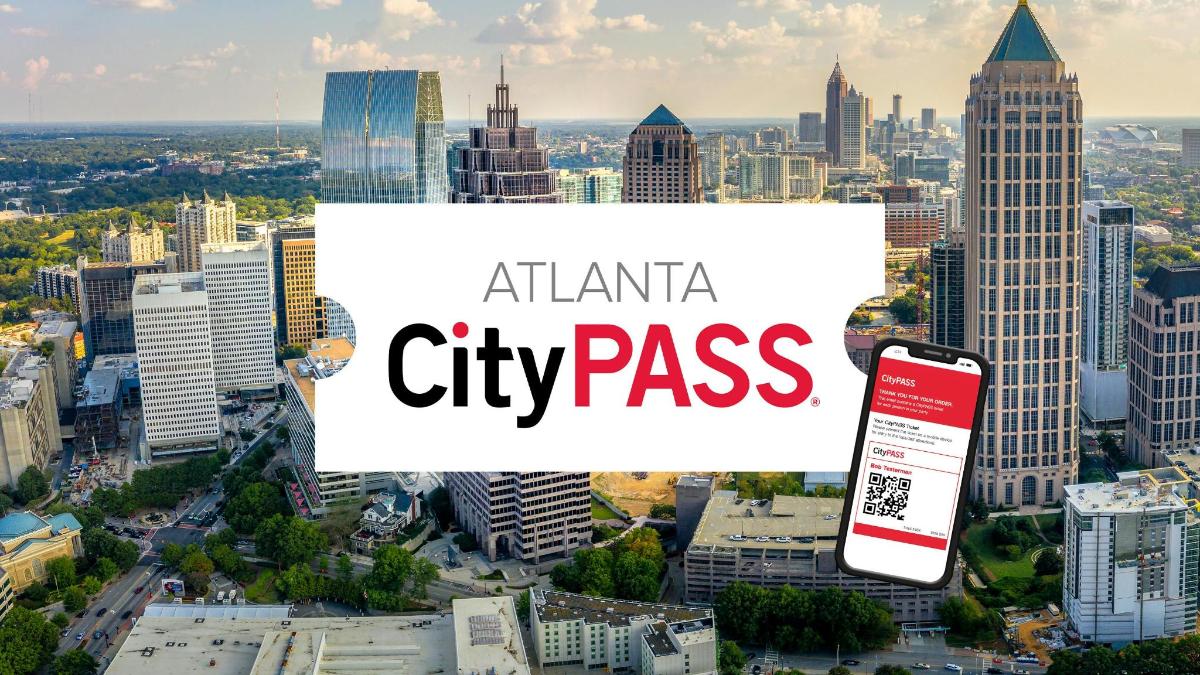 a cityscape with a cell phone and the words atanta city pass