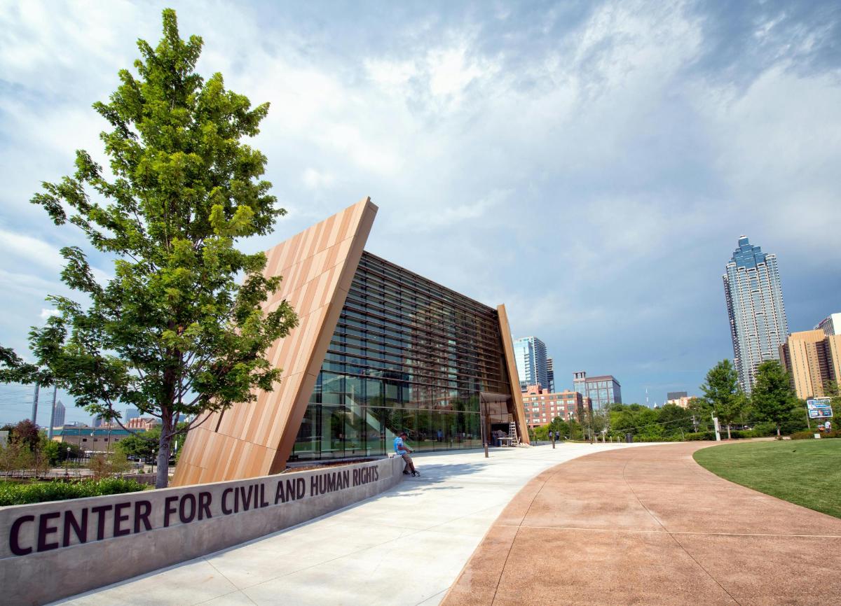 a tree in front of a building with the center for civil engineering