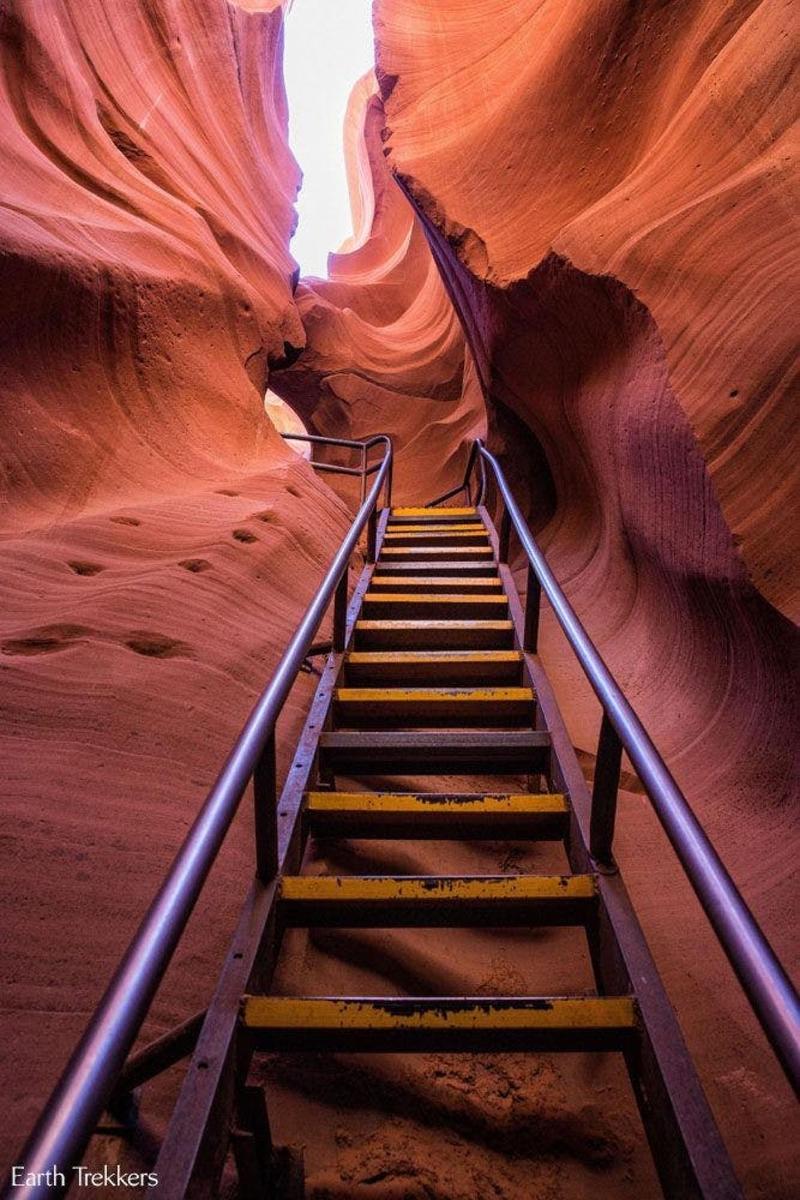 a staircase leading into a slot canyon