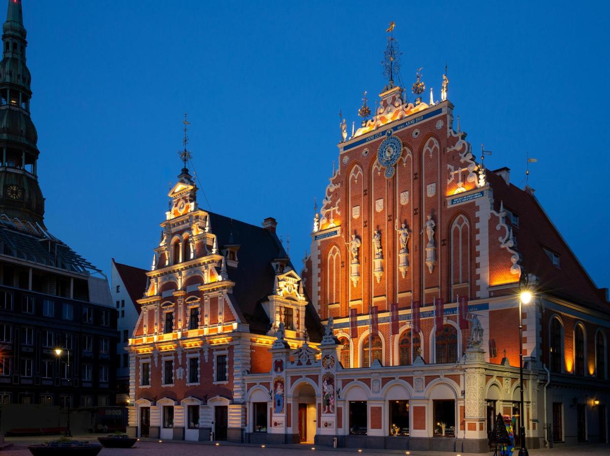 a large building with lights on it at night
