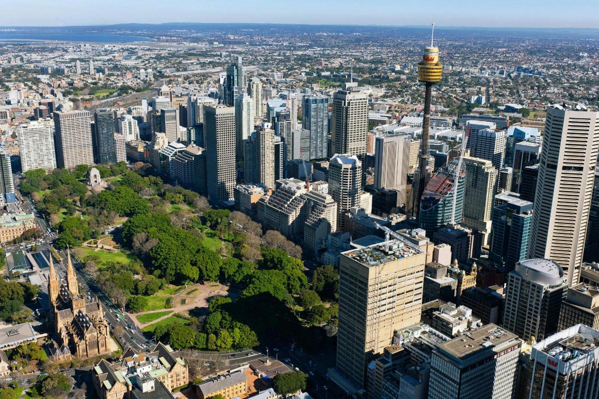 an aerial view of a city with skyscrapers