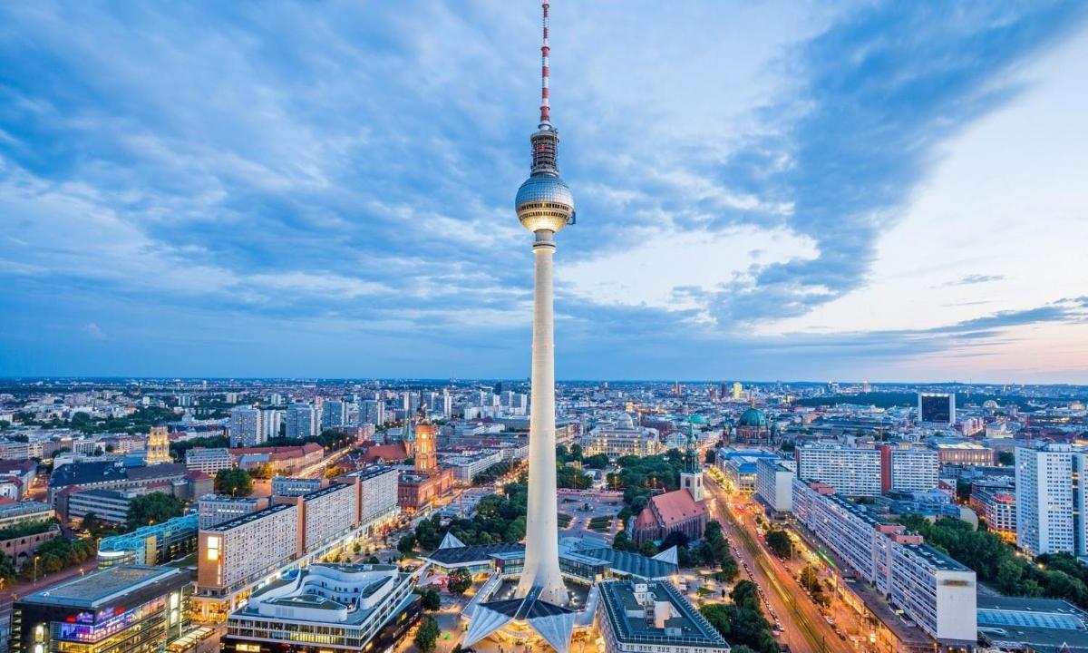 a view of a city with a tall tower